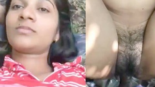 Indian beauty pleasures herself outdoors