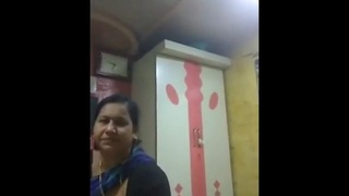 Indian aunt performs a sensual oral sex act on her spouse