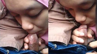 A beautiful girl with hijab gives a sensual blowjob to a small penis