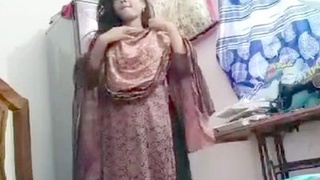 Beautiful girl flaunting her figure in the village