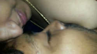 Aroused Indian aunt's boyfriend eagerly sucks her breasts