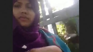 Indian-origin woman in hijab and partner engage in romantic outdoor activities