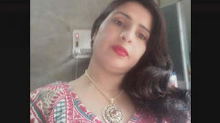 Indian mature woman engages in sexual activity on camera