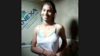 This video features a charming Desi girl being showcased