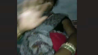 An older woman with a large vagina engages in explicit sexual activity