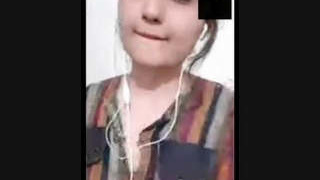 A girl from Pakistan fondling her breasts