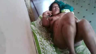 Middle-aged desi woman has sex with young neighbor on the floor