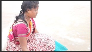 Middle-aged woman and her younger partner have passionate sex on the beach