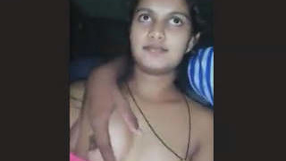 Desi wife's breasts fondled by her husband