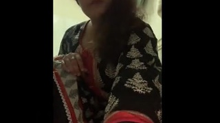 Pakistani housewife seductively strips and poses for camera