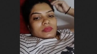 Seductive Indian woman flaunts her large breasts