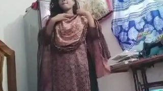 A cute Indian girl reveals her body on camera from a village background