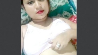 Attractive and seductive Assamese bhabi displaying her assets