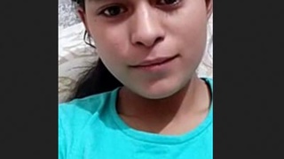 Village girl displays her adorable charm
