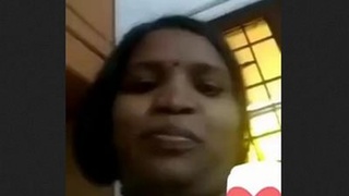 Indian aunt displays her large breasts and vagina
