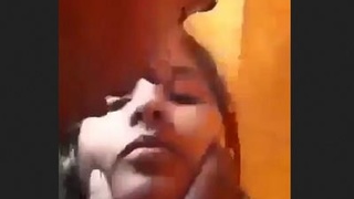 Two lovers engage in fervent kissing