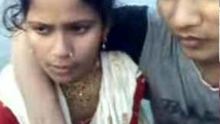 A young Indian girl receives a passionate kiss from her college-age neighbors