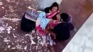 A mature woman with large breasts has her outdoor pussy pleasured with oral sex and fingers, while making audible sounds of pleasure