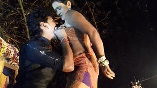 Indian girl's sensual stage performance with baring breasts and intimate contact