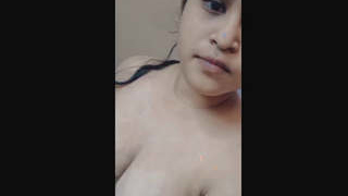 Attractive female restroom attendant performs sensually