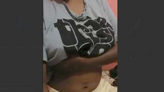 Indian mature woman revealing her large breasts