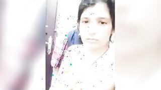 Pretty Indian housewife shoots her own nude video