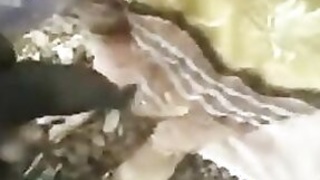 Outdoor video of a slender Indian girl pleasuring her sexually aroused boyfriend