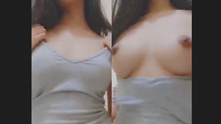 Attractive college girl reveals her breasts to her boyfriend