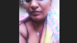 Indian housewife Keethi reveals her breasts in a live broadcast