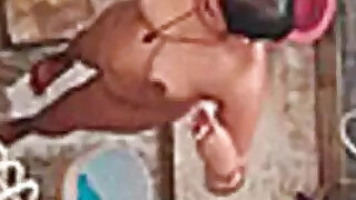 Peeping at the bathtub Indian Auntie Video
