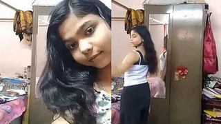 Indian girl's intimate self-portrait showcasing her voluptuous and attractive rear end for her boyfriend