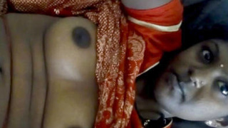 Indian beauty flaunts her large breasts and intimate parts in a live performance