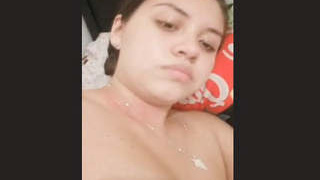 Attractive belly dancer reveals cleavage