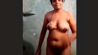 Indian Tamil wife takes a bath