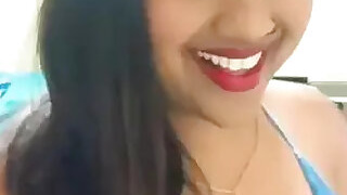 Desi girl with huge boobs in a blue suit