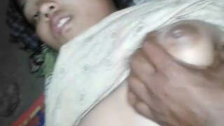 Adorable girl fondling her breasts and engages in sexual activity