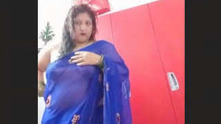Sensual wife's breasts exposed in a saree