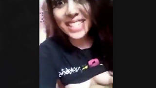 A charming Indian girl reveals her breasts and shares the experience with audio