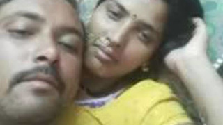 Indian couple undressed and having fun in bed