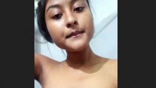 Brunette Indian teen strips down to reveal her sensual figure
