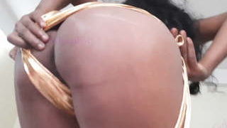 An Indian woman flaunts her large posterior in a steamy video