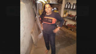 Aroused girl pleasuring herself with oral and manual stimulation