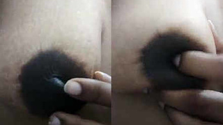 A girl from Andhra Pradesh displays her areola