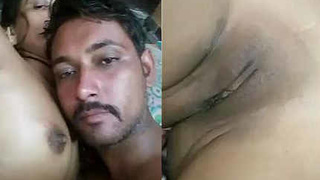 Arousing Indian couple indulges in passionate breast stimulation