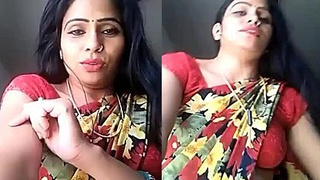Young woman reveals her belly button in a seductive saree