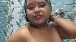 Indian chubby wife undresses for a bath